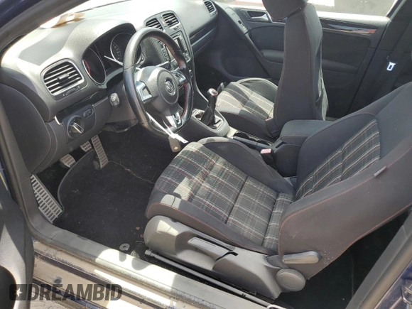 2012 Volkswagen GTI w/Conv & Sunroof с VIN WVWEV7AJ4CW222484, выставлен на аукционе Copart как лот 57270915 с пробегом Не указан миль и Списание • Salvage title. История ставок и продаж доступна на DreamBid. Изображение 7.