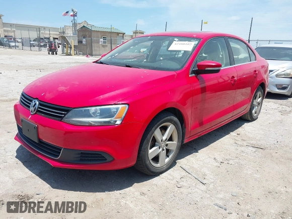 2013 Volkswagen Jetta TDI w/Premium with VIN 3VW3L7AJ6DM287865, listed as a IAAI auction lot 42480102 with 181,677 mi miles and . Bid and sale history available at DreamBid. Image 2.