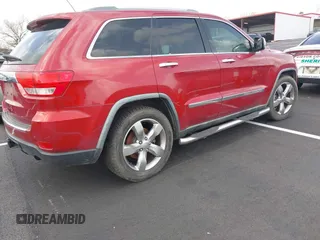 2011 Jeep Grand Cherokee Overland with VIN 1J4RS6GT4BC561169, listed as a IAAI auction lot 41847912 with 220,713 mi miles and . Bid and sale history available at DreamBid. Image 4.