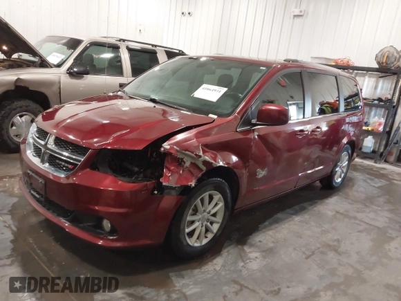 2019 Dodge Grand Caravan SXT with VIN 2C4RDGCG9KR678235, listed as a IAAI auction lot 41864931 with 127,848 mi miles and . Bid and sale history available at DreamBid. Image 2.