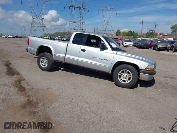 2001 Dodge Dakota SLT with VIN 1B7GG22XX1S348751, listed as a IAAI auction lot 42077395 with 148,034 mi miles and . Bid and sale history available at carsss.com. Image 1.