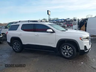 2023 GMC Acadia SLT with VIN 1GKKNMLS0PZ212549, listed as a IAAI auction lot 41371189 with 26,805 mi miles and . Bid and sale history available at DreamBid. Image 13.