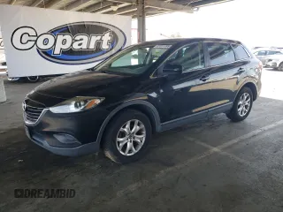 2015 Mazda CX-9 Touring z VIN JM3TB2CV8F0459643, wystawiony jako Copart lot #57351095 z przebiegiem 150 571 mil mil oraz Czysty tytuł • Clean title. Historia ofert i sprzedaży dostępna na DreamBid. Obrazek 1.