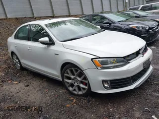2014 Volkswagen Jetta GLI z VIN 3VW4T7AJ7EM315601, wystawiony jako IAAI lot #42190687 z przebiegiem 113 220 mil mil oraz . Historia ofert i sprzedaży dostępna na DreamBid. Obrazek 1.