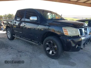 2004 Nissan Titan LE with VIN 1N6AA07B74N525703, listed as a IAAI auction lot 42572763 with Not provided miles and . Bid and sale history available at DreamBid. Image 1.