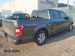 2018 Ford F-150 XL with VIN 1FTEW1E53JFD33161, listed as a IAAI auction lot 41796374 with 64,910 mi miles. Bid and sale history available at carsss.com. Image 4.