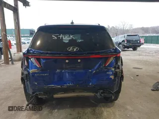 2022 Hyundai Tucson SEL with VIN 5NMJBCAEXNH069845, listed as a IAAI auction lot 41481383 with 10,985 mi miles and . Bid and sale history available at DreamBid. Image 6.