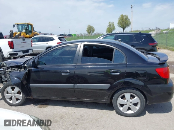 2008 Kia Rio LX with VIN KNADE123X86323641, listed as a IAAI auction lot 41985631 with 175,102 mi miles and . Bid and sale history available at DreamBid. Image 13.