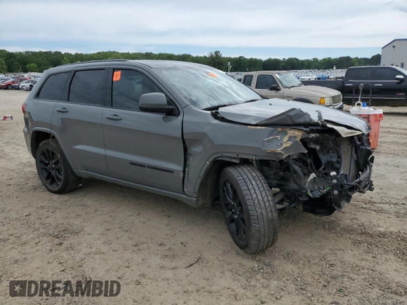 2021 Jeep Grand Cherokee Laredo E with VIN 1C4RJEAG9MC657803, listed as a Copart auction lot 55797185 with 79,357 mi miles and Salvage title. Bid and sale history available at DreamBid. Image 4.