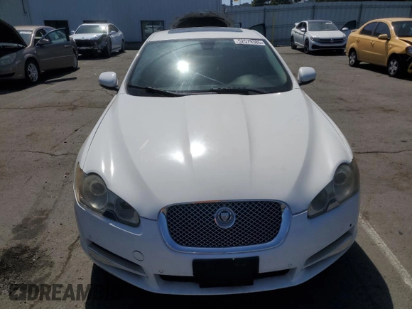 2011 Jaguar XF with VIN SAJWA0FB6BLR86959, listed as a Copart auction lot 52579385 with 110,087 mi miles and Salvage Title. Bid and sale history available at carsss.com. Image 5.