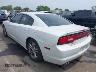 2013 Dodge Charger SE with VIN 2C3CDXFG7DH568461, listed as a IAAI auction lot 42025979 with 187,076 mi miles and . Bid and sale history available at carsss.com. Image 3.