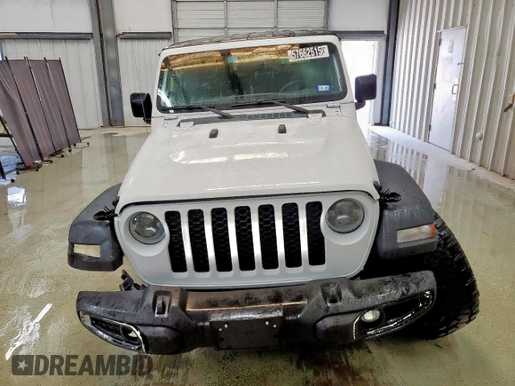 2023 Jeep Gladiator Sport S with VIN 1C6HJTAG1PL542530, listed as a Copart auction lot 60669075 with 44,323 mi miles and Salvage title. Bid and sale history available at DreamBid. Image 5.