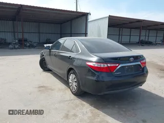 2015 Toyota Camry XLE with VIN 4T1BF1FK7FU037419, listed as a IAAI auction lot 42053259 with 118,453 mi miles and . Bid and sale history available at DreamBid. Image 3.