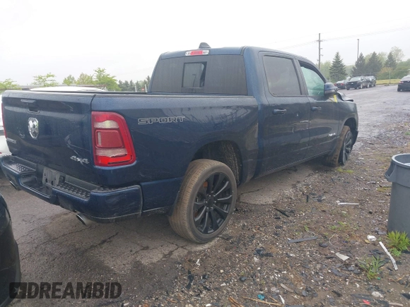 2023 Ram 1500 Laramie with VIN 1C6SRFJT9PN542437, listed as a IAAI auction lot 42256410 with 5 mi miles and . Bid and sale history available at DreamBid. Image 4.