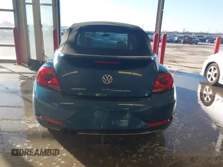 2018 Volkswagen Beetle S с VIN 3VW5DAAT2JM515005, выставлен на аукционе IAAI как лот 41093518 с пробегом Не указан миль и . История ставок и продаж доступна на DreamBid. Изображение 15.