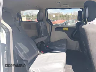 2015 Dodge Grand Caravan SE with VIN 2C4RDGBG6FR613981, listed as a IAAI auction lot 42043348 with 87,615 mi miles and . Bid and sale history available at DreamBid. Image 8.