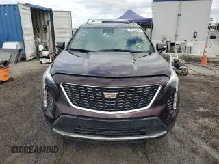 2021 Cadillac XT4 FWD Premium Luxury z VIN 1GYFZCR45MF080027, wystawiony jako Copart lot #46195835 z przebiegiem Nie podano mil oraz Nie do naprawy • Non repairable. Historia ofert i sprzedaży dostępna na DreamBid. Obrazek 5.