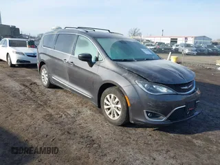 2019 Chrysler Pacifica Touring L with VIN 2C4RC1BG2KR526461, listed as a IAAI auction lot 41653889 with Not provided miles and . Bid and sale history available at DreamBid. Image 1.