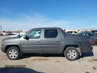 2007 Honda Ridgeline RTL z VIN 2HJYK16547H526249, wystawiony jako IAAI lot #41769625 z przebiegiem 173 168 mil mil oraz . Historia ofert i sprzedaży dostępna na DreamBid. Obrazek 14.
