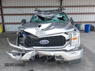2021 Ford F-150 XL z VIN 1FTFW1E89MFC21046, wystawiony jako IAAI lot #42668472 z przebiegiem 83 083 mil mil oraz . Historia ofert i sprzedaży dostępna na DreamBid. Obrazek 11.