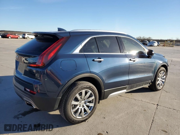 2021 Cadillac XT4 FWD Premium Luxury z VIN 1GYFZCR43MF021302, wystawiony jako Copart lot #41668755 z przebiegiem 46 047 mil mil oraz Szkody całkowita. Historia ofert i sprzedaży dostępna na DreamBid. Obrazek 3.