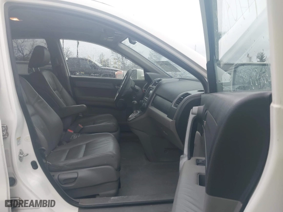 2009 Honda CR-V EX-L with VIN 5J6RE48759L015827, listed as a IAAI auction lot 41904514 with 173,820 mi miles. Bid and sale history available at carsss.com. Image 5.