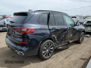 2023 BMW X5 xDrive45e with VIN 5UXTA6C04P9S03633, listed as a Copart auction lot 54916645 with Not provided miles and Salvage title. Bid and sale history available at DreamBid. Image 3.