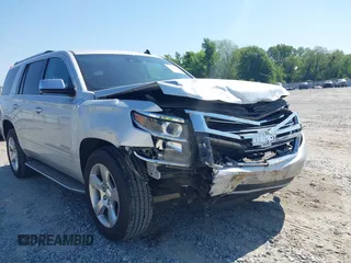 2015 Chevrolet Tahoe LTZ z VIN 1GNSCCKC8FR149888, wystawiony jako IAAI lot #42049804 z przebiegiem 182 991 mil mil oraz . Historia ofert i sprzedaży dostępna na DreamBid. Obrazek 6.