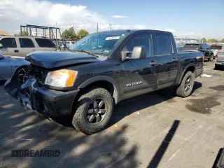 2015 Nissan Titan Pro-4X with VIN 1N6BA0EC8FN510761, listed as a Copart auction lot 76606044 with 142,703 mi miles and Salvage title. Bid and sale history available at DreamBid. Image 1.