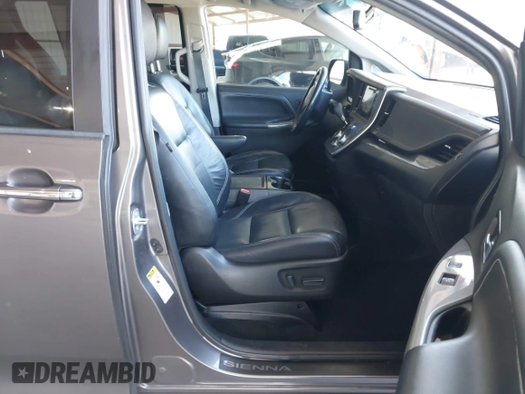 2015 Toyota Sienna SE with VIN 5TDXK3DC1FS667924, listed as a IAAI auction lot 42062805 with 123,504 mi miles. Bid and sale history available at carsss.com. Image 5.