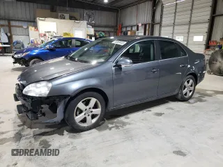 2009 Volkswagen Jetta SE with VIN 3VWRZ71K79M016032, listed as a Copart auction lot 59369445 with 177,075 mi miles and Salvage title. Bid and sale history available at DreamBid. Image 1.