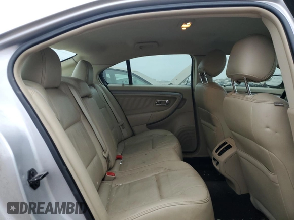 2016 Ford Taurus SEL with VIN 1FAHP2E9XGG144955, listed as a Copart auction lot 82207634 with 128,823 mi miles and Salvage Title. Bid and sale history available at DreamBid. Image 10.