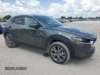 2024 Mazda CX-30 S Premium z VIN 3MVDMBDM4RM615609, wystawiony jako Copart lot #57761055 z przebiegiem 20 721 mil mil oraz Szkoda całkowita • Salvage title. Historia ofert i sprzedaży dostępna na DreamBid. Obrazek 4.