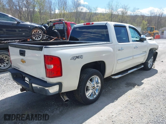 2012 Chevrolet Silverado 1500 LTZ with VIN 3GCPKTE7XCG207494, listed as a IAAI auction lot 42045069 with 304,090 mi miles and . Bid and sale history available at DreamBid. Image 4.