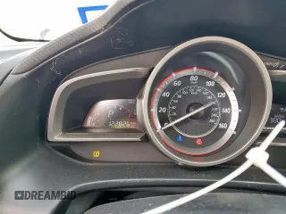 2014 Mazda 3 i Touring z VIN 3MZBM1V76EM112344, wystawiony jako Copart lot #57168785 z przebiegiem 122 826 mil mil oraz Szkoda całkowita • Salvage title. Historia ofert i sprzedaży dostępna na DreamBid. Obrazek 9.