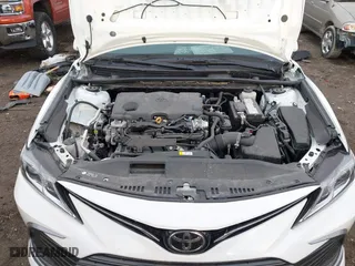 2024 Toyota Camry LE with VIN 4T1C11AK5RU899617, listed as a IAAI auction lot 41810634 with 24,295 mi miles. Bid and sale history available at carsss.com. Image 10.