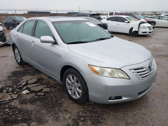 2007 Toyota Camry CE with VIN 4T1BE46K57U075558, listed as a IAAI auction lot 41948885 with 275,636 mi miles. Bid and sale history available at carsss.com. Image 1.