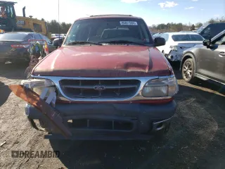 1999 Ford Explorer XLT with VIN 1FMDU34E7XZA60386, listed as a Copart auction lot 86851594 with 218,592 mi miles and Salvage title. Bid and sale history available at DreamBid. Image 5.