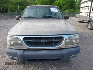 1999 Ford Explorer XLT with VIN 1FMZU34E3XUA80301, listed as a IAAI auction lot 42094304 with 145,373 mi miles and . Bid and sale history available at DreamBid. Image 6.