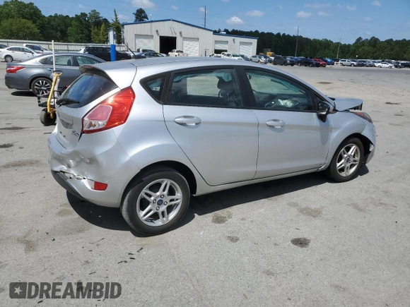 2019 Ford Fiesta SE z VIN 3FADP4EJ2KM142992, wystawiony jako Copart lot #55204795 z przebiegiem 98 018 mil mil oraz Szkoda całkowita • Salvage title. Historia ofert i sprzedaży dostępna na DreamBid. Obrazek 3.
