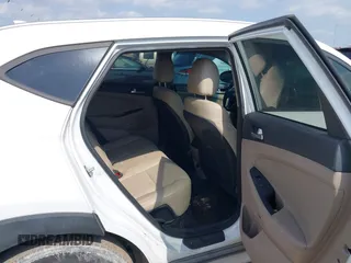 2019 Hyundai Tucson Sport with VIN KM8J33AL1KU861698, listed as a IAAI auction lot 42129173 with 100,160 mi miles. Bid and sale history available at carsss.com. Image 8.