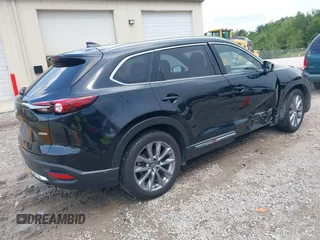 2022 Mazda CX-9 Grand Touring with VIN JM3TCBDYXN0627657, listed as a IAAI auction lot 42498856 with 61,044 mi miles and . Bid and sale history available at DreamBid. Image 4.