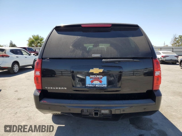 2014 Chevrolet Suburban LS with VIN 1GNSCHE03ER132039, listed as a Copart auction lot 68390234 with 129,744 mi miles and Salvage Title. Bid and sale history available at carsss.com. Image 6.