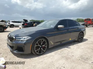 2022 BMW 5 Series M550i xDrive z VIN WBA13BK09NCJ00508, wystawiony jako Copart lot #58077634 z przebiegiem Nie podano mil oraz . Historia ofert i sprzedaży dostępna na DreamBid. Obrazek 1.