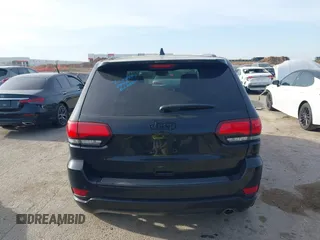 2018 Jeep Grand Cherokee Laredo E with VIN 1C4RJEAG4JC311699, listed as a IAAI auction lot 41876920 with 42,584 mi miles and . Bid and sale history available at DreamBid. Image 16.