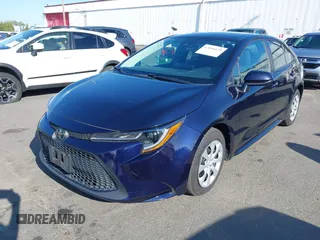2021 Toyota Corolla LE with VIN 5YFEPMAE4MP210485, listed as a IAAI auction lot 42096039 with 50,398 mi miles. Bid and sale history available at carsss.com. Image 2.