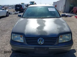 2003 Volkswagen Jetta GL z VIN 3VWRK69M43M117878, wystawiony jako IAAI lot #42553211 z przebiegiem 183 524 mil mil oraz . Historia ofert i sprzedaży dostępna na DreamBid. Obrazek 6.