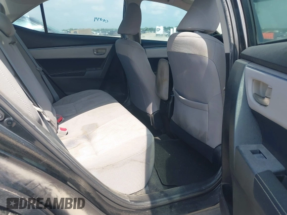 2015 Toyota Corolla L with VIN 5YFBURHE7FP255910, listed as a IAAI auction lot 42132289 with 97,635 mi miles and . Bid and sale history available at DreamBid. Image 8.