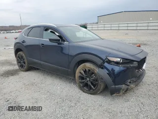 2023 Mazda CX-30 Premium with VIN 3MVDMBDY6PM507833, listed as a Copart auction lot 47166285 with 10,196 mi miles and Salvage title. Bid and sale history available at DreamBid. Image 4.