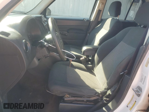 2014 Jeep Patriot Sport with VIN 1C4NJPBA5ED550294, listed as a Copart auction lot 77843854 with 204,233 mi miles and Salvage Title. Bid and sale history available at carsss.com. Image 7.